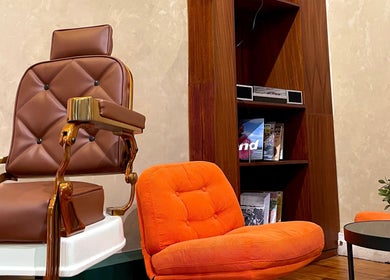 Silla de barbero marrón en Grizzly Barber Club, Ciudad De México, Ciudad De México, MX.