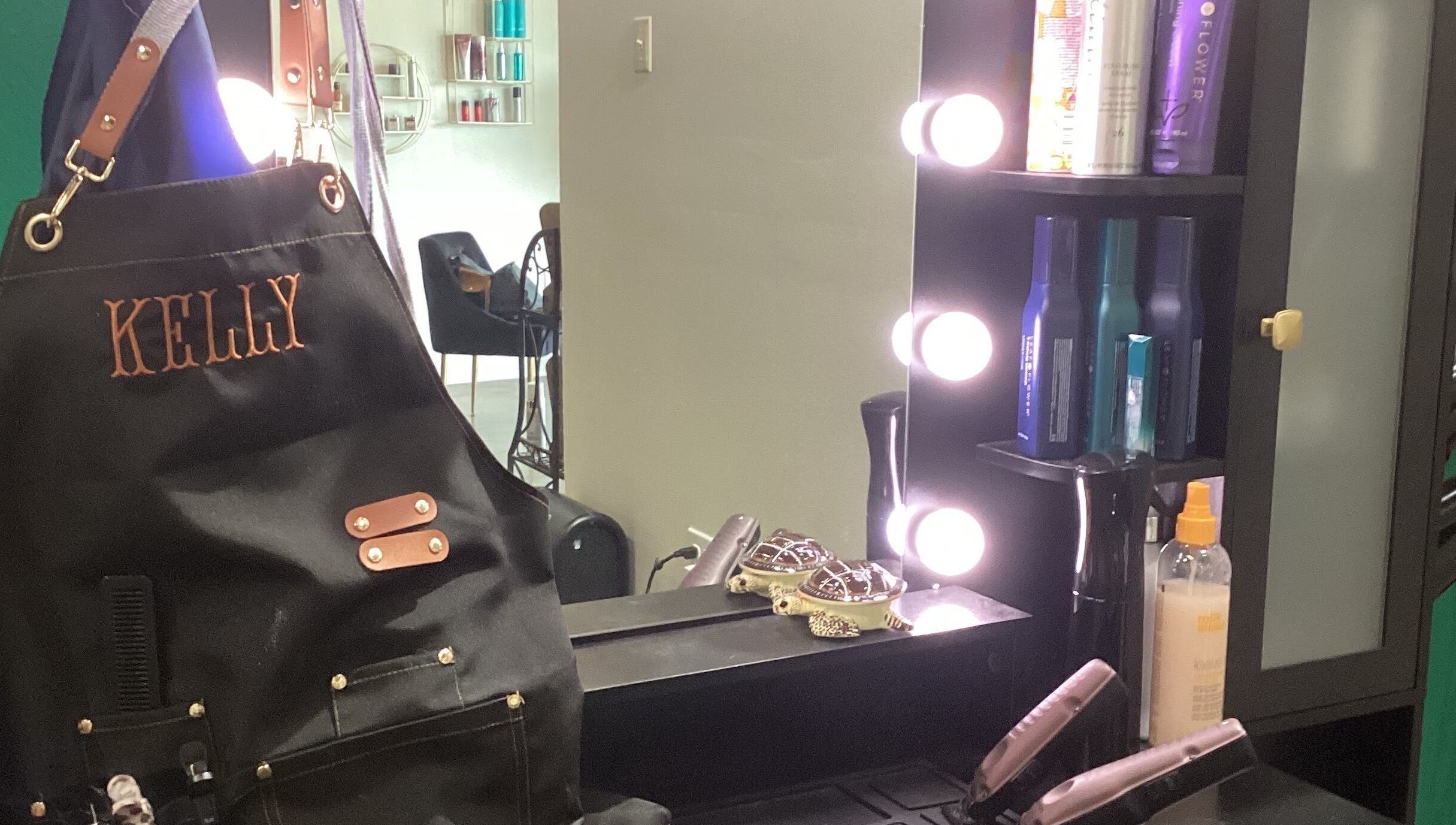 Salon station at Styles By Kelly in Ruston, Louisiana, US, featuring stylish equipment and products.