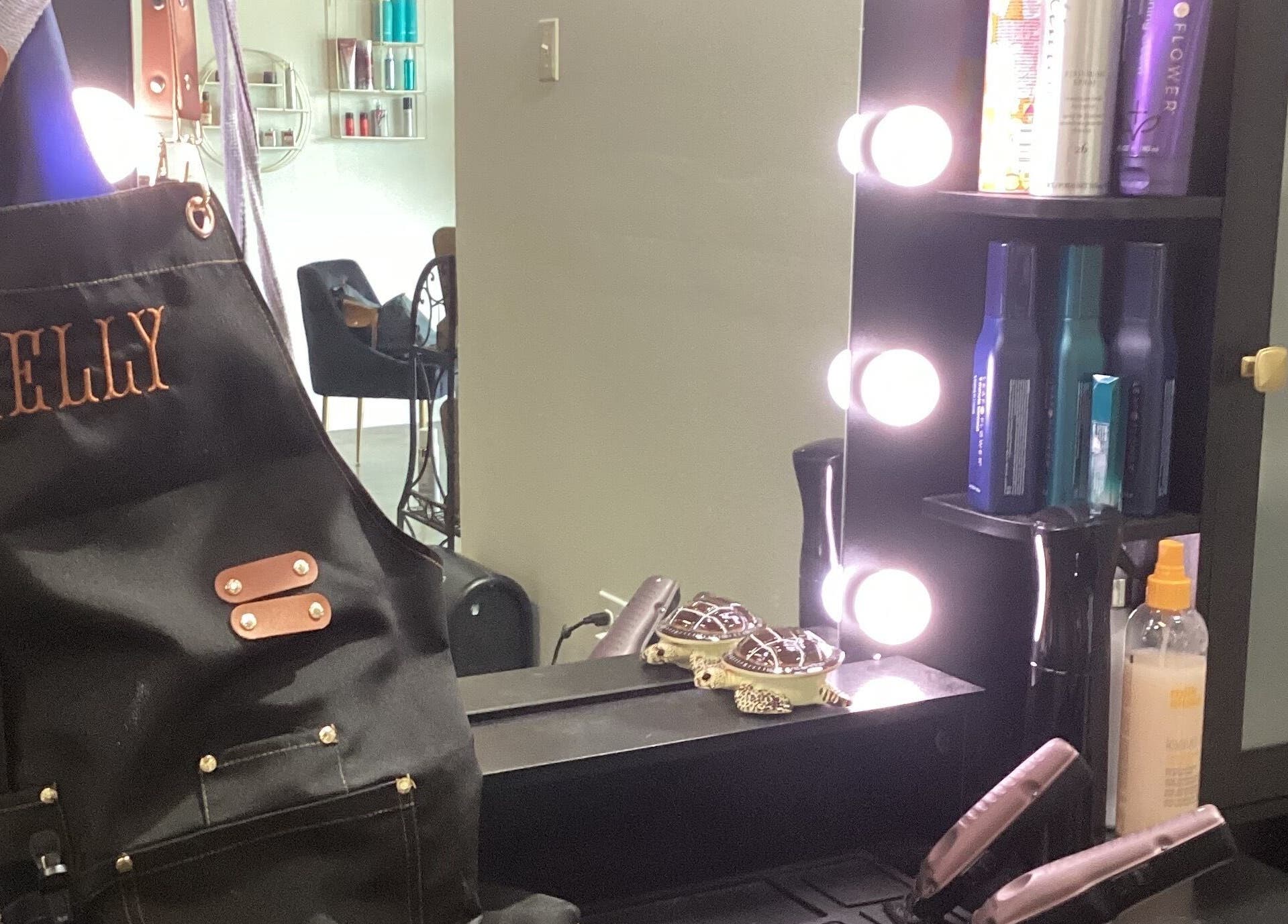 Salon station at Styles By Kelly in Ruston, Louisiana, US, featuring stylish equipment and products.