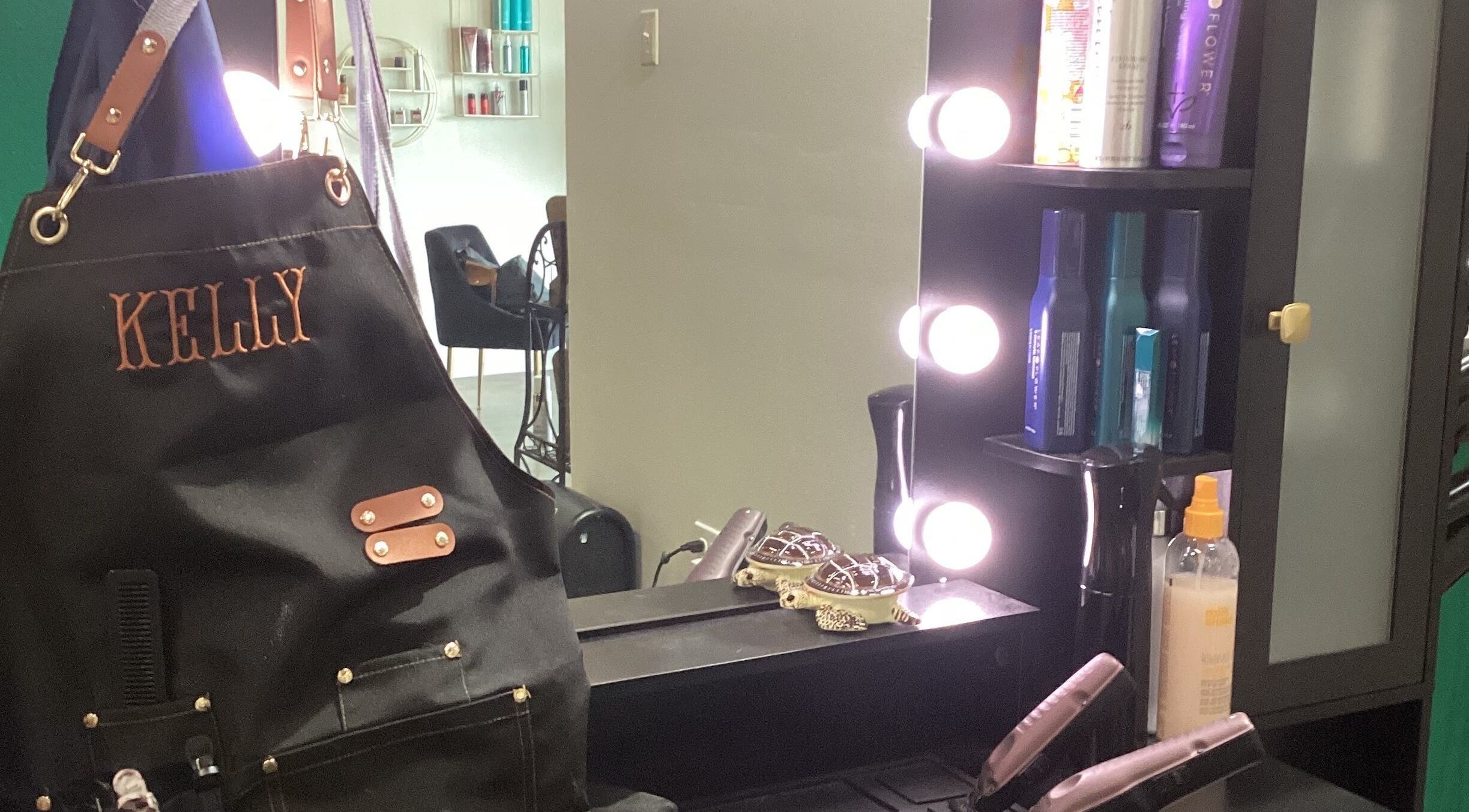 Salon station at Styles By Kelly in Ruston, Louisiana, US, featuring stylish equipment and products.