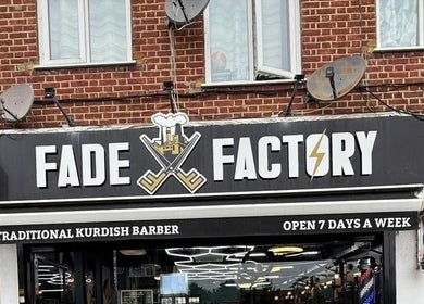 Front view of Fade Factory, a traditional Kurdish barber in Morden, England, GB.