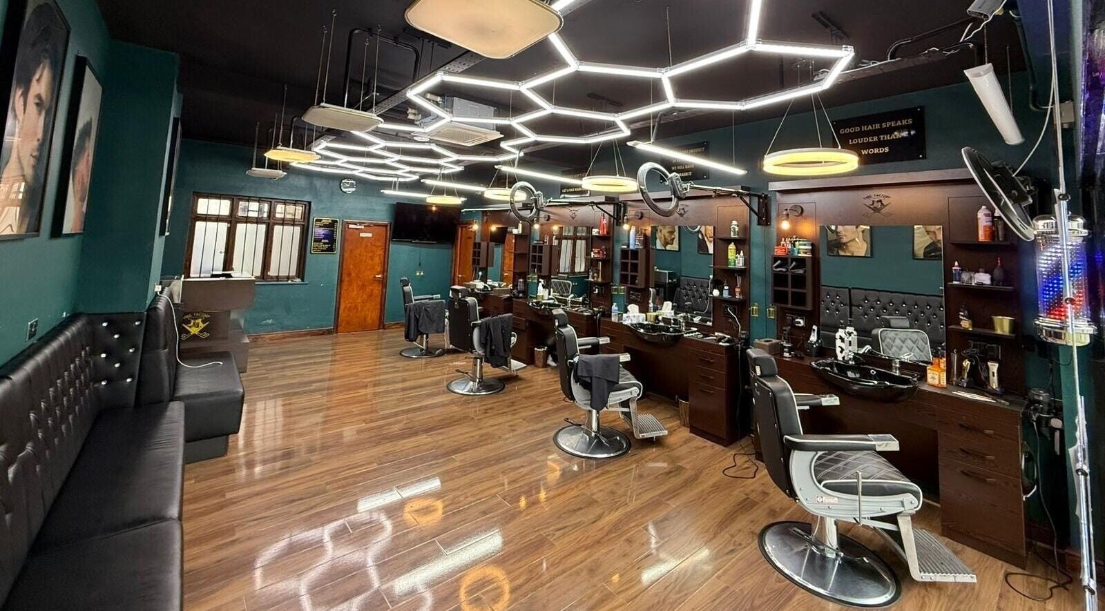 Fade Factory barbershop interior with modern design and styling chairs, Morden, England, GB.