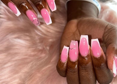 Stunning pink nails with heart designs from Nailsemporium268, Saint John's, Saint John, AG.