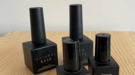 Collection of black nail polish bottles at ShoshanaStudios, Montréal, Québec, CA.