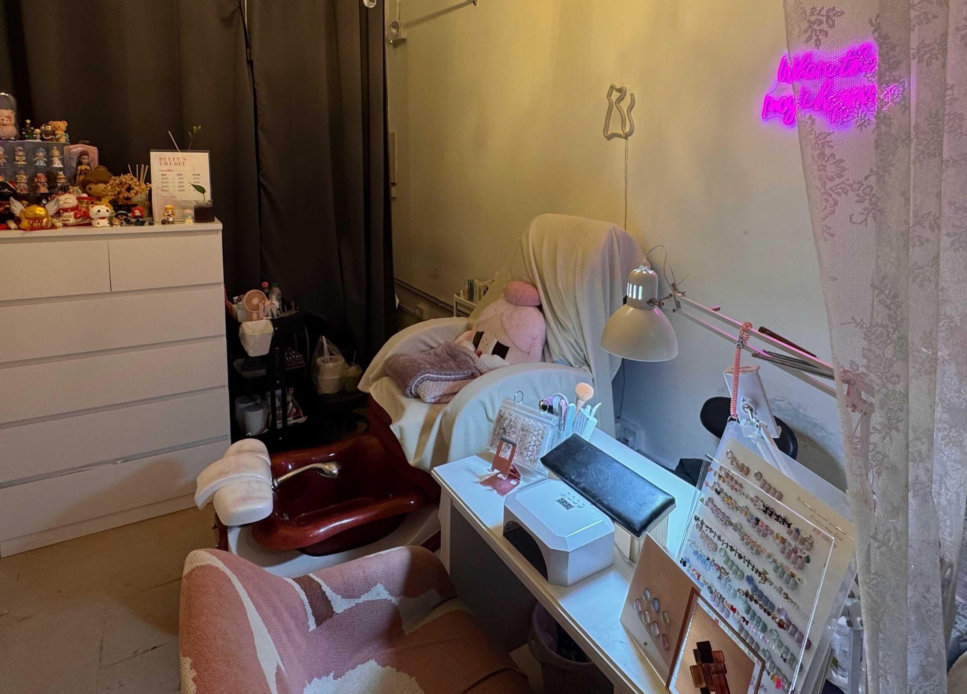 Cozy and inviting treatment corner at The Belle Studio, Singapore, Singapore, SG with relaxing decor.