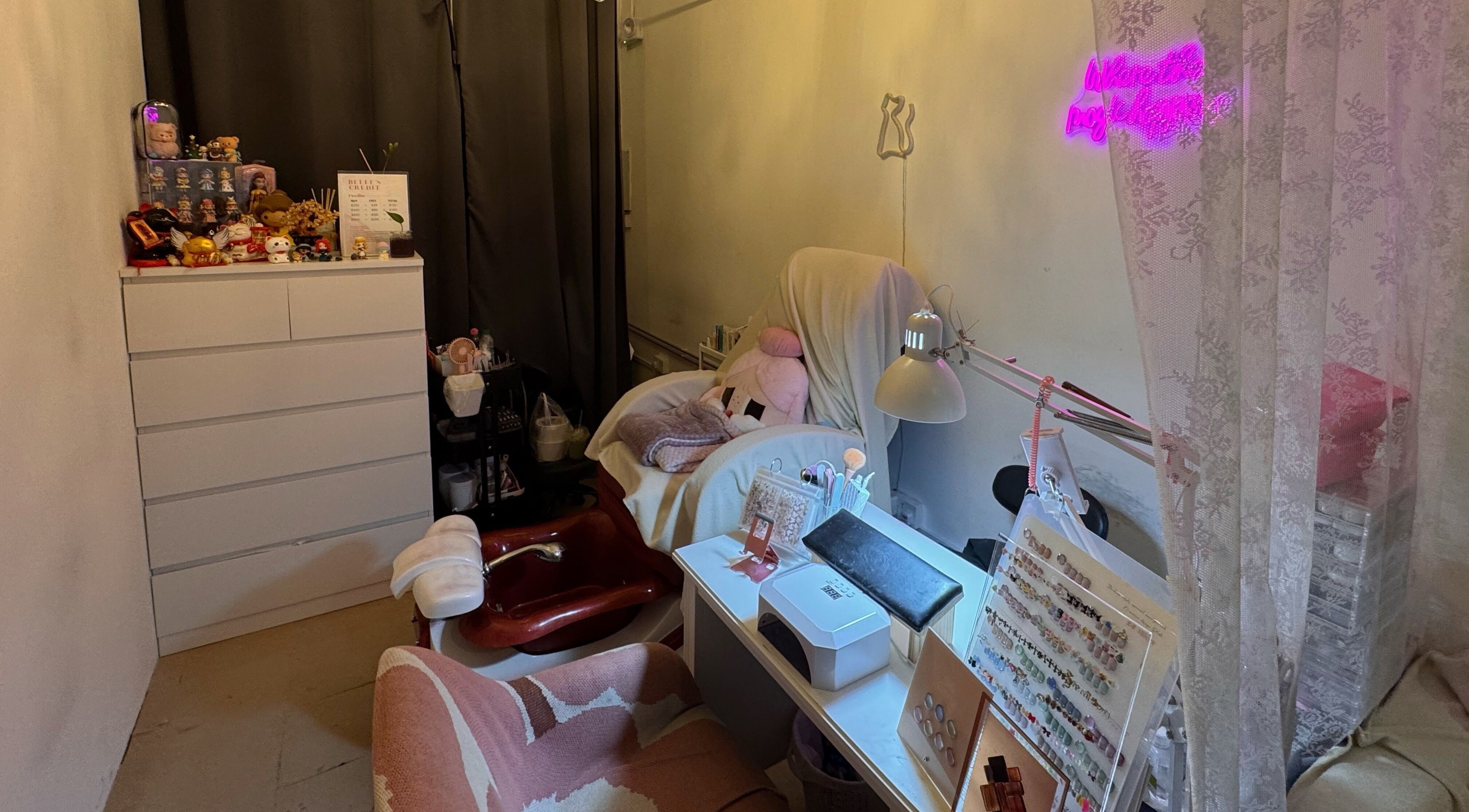 Cozy and inviting treatment corner at The Belle Studio, Singapore, Singapore, SG with relaxing decor.