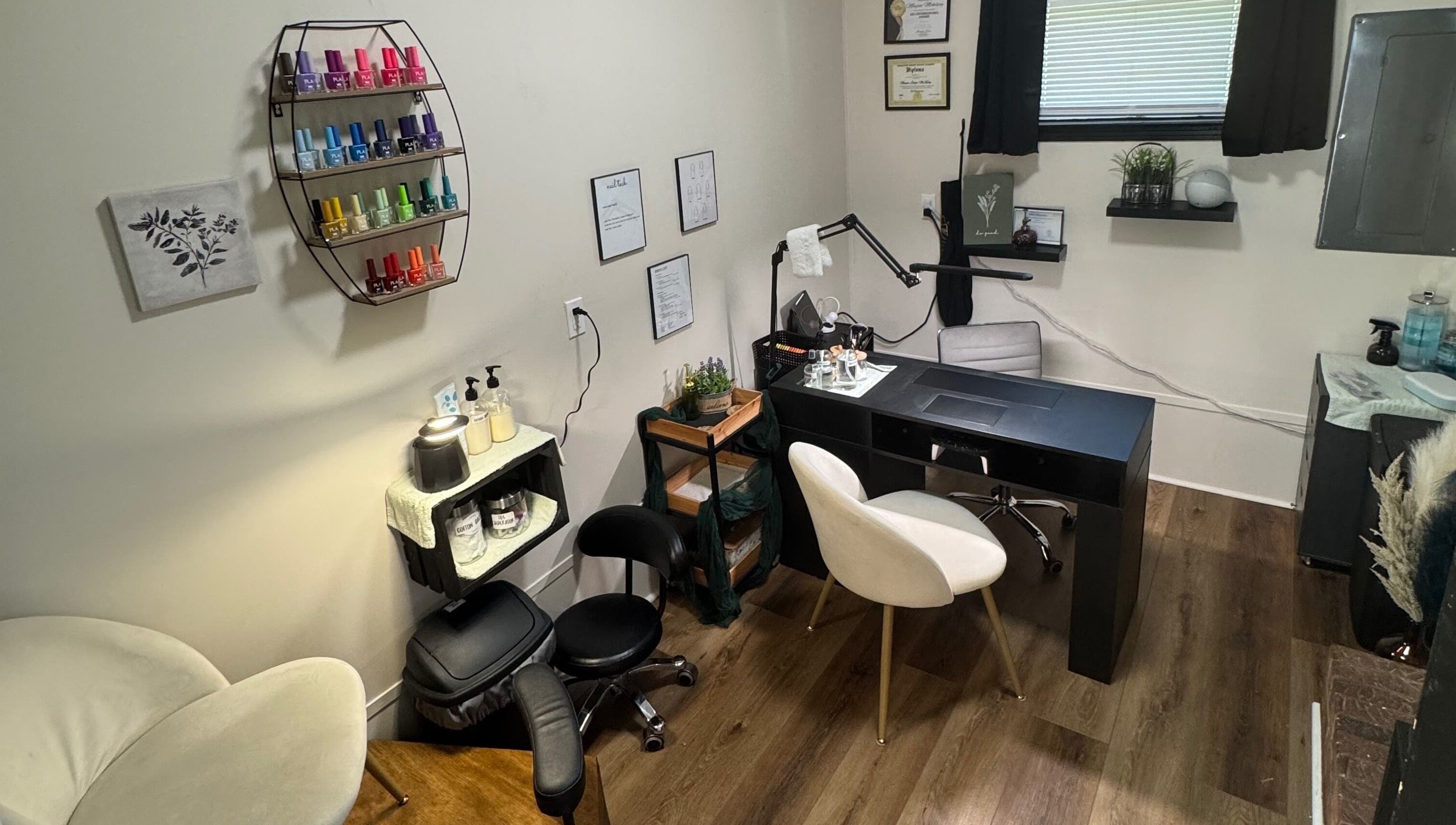 Elegant nail studio at NailsByMaycee, Estill Springs, Tennessee, US, featuring a stylish workspace and colorful polish display.