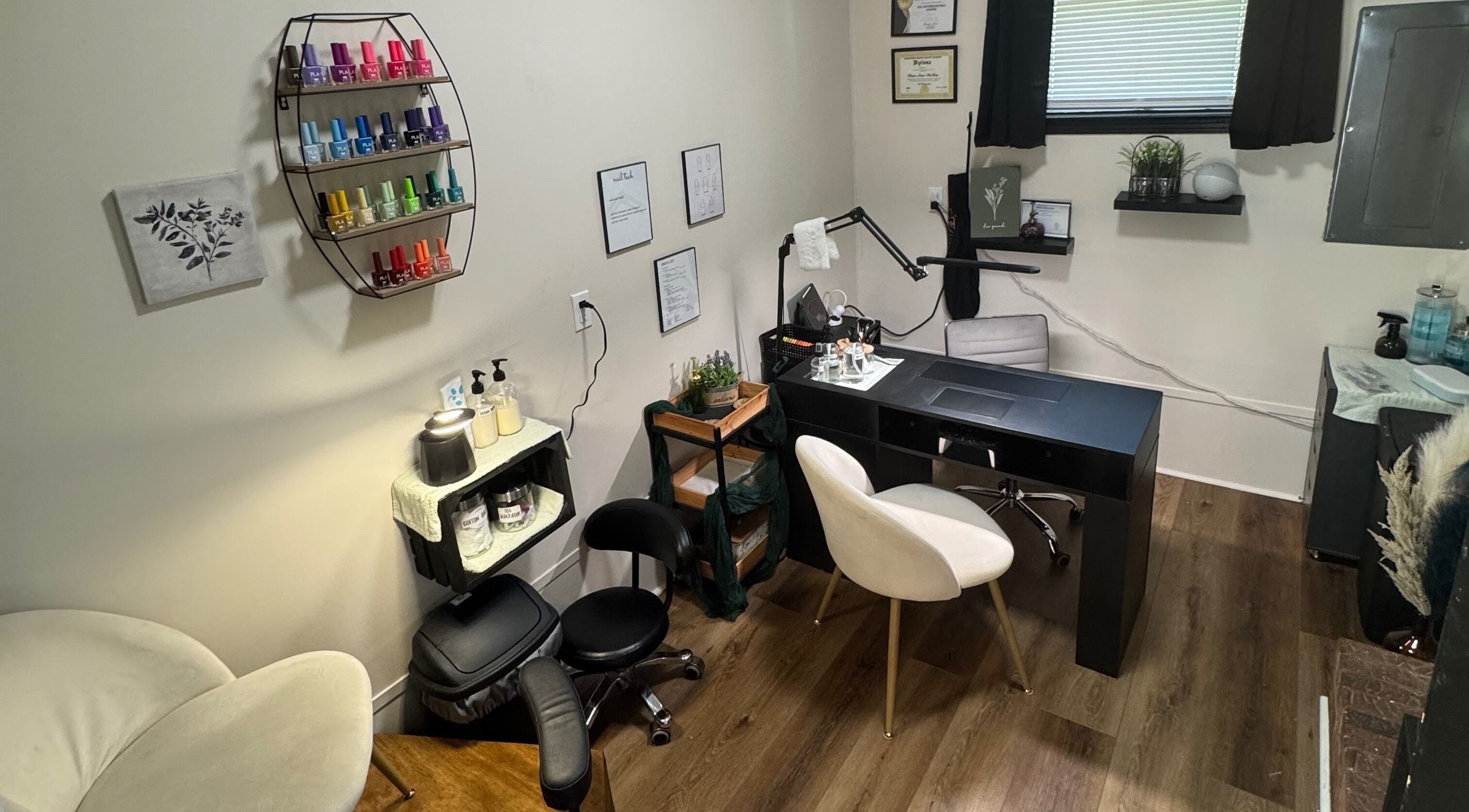 Elegant nail studio at NailsByMaycee, Estill Springs, Tennessee, US, featuring a stylish workspace and colorful polish display.