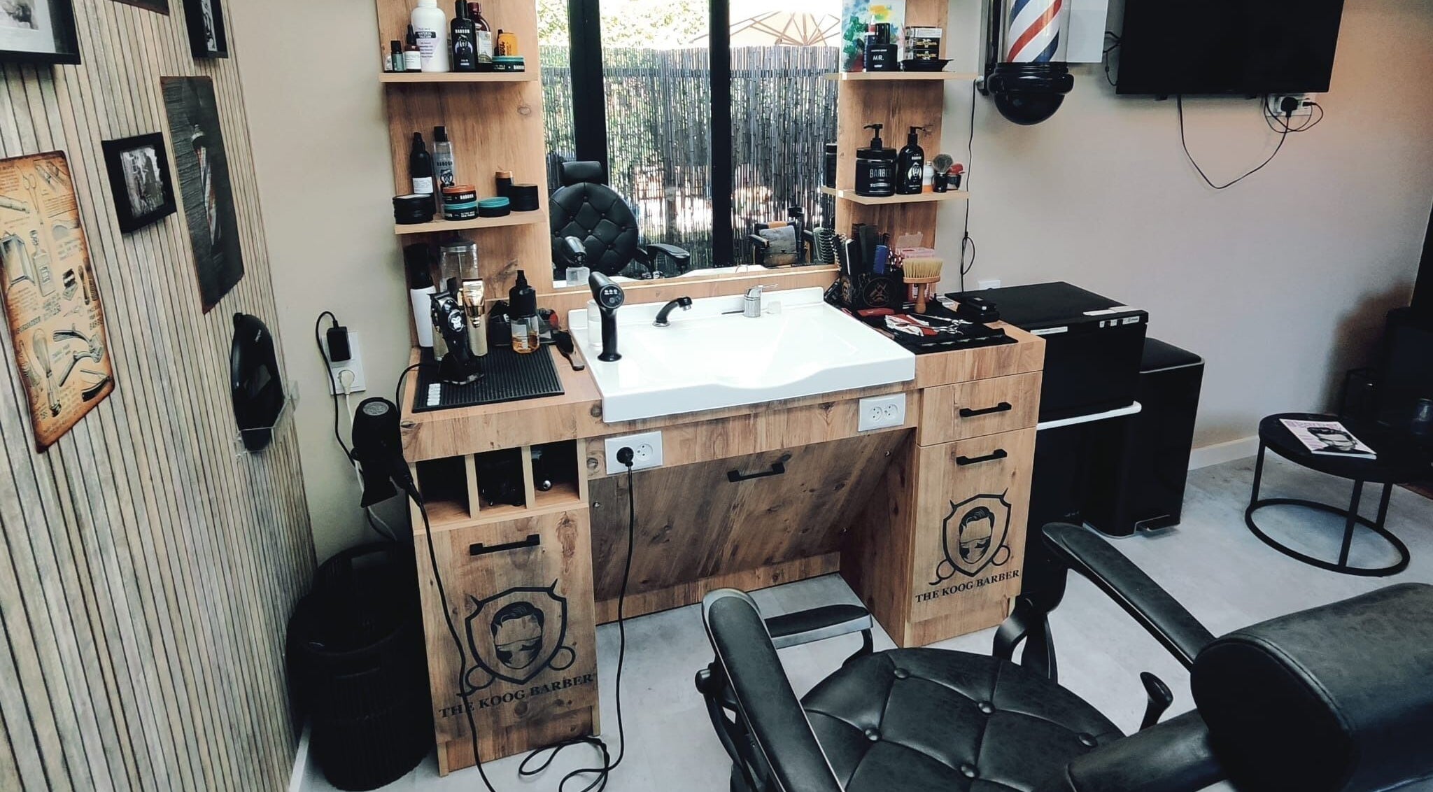 Modern barber station at The Koog Barber, Koog Aan De Zaan, Noord-holland, NL, equipped with grooming tools.