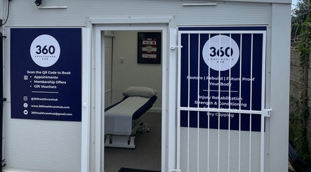 Entrance to 360 Healthcare Hub in Wigan, England, GB, showcasing wellness services and bookings info.