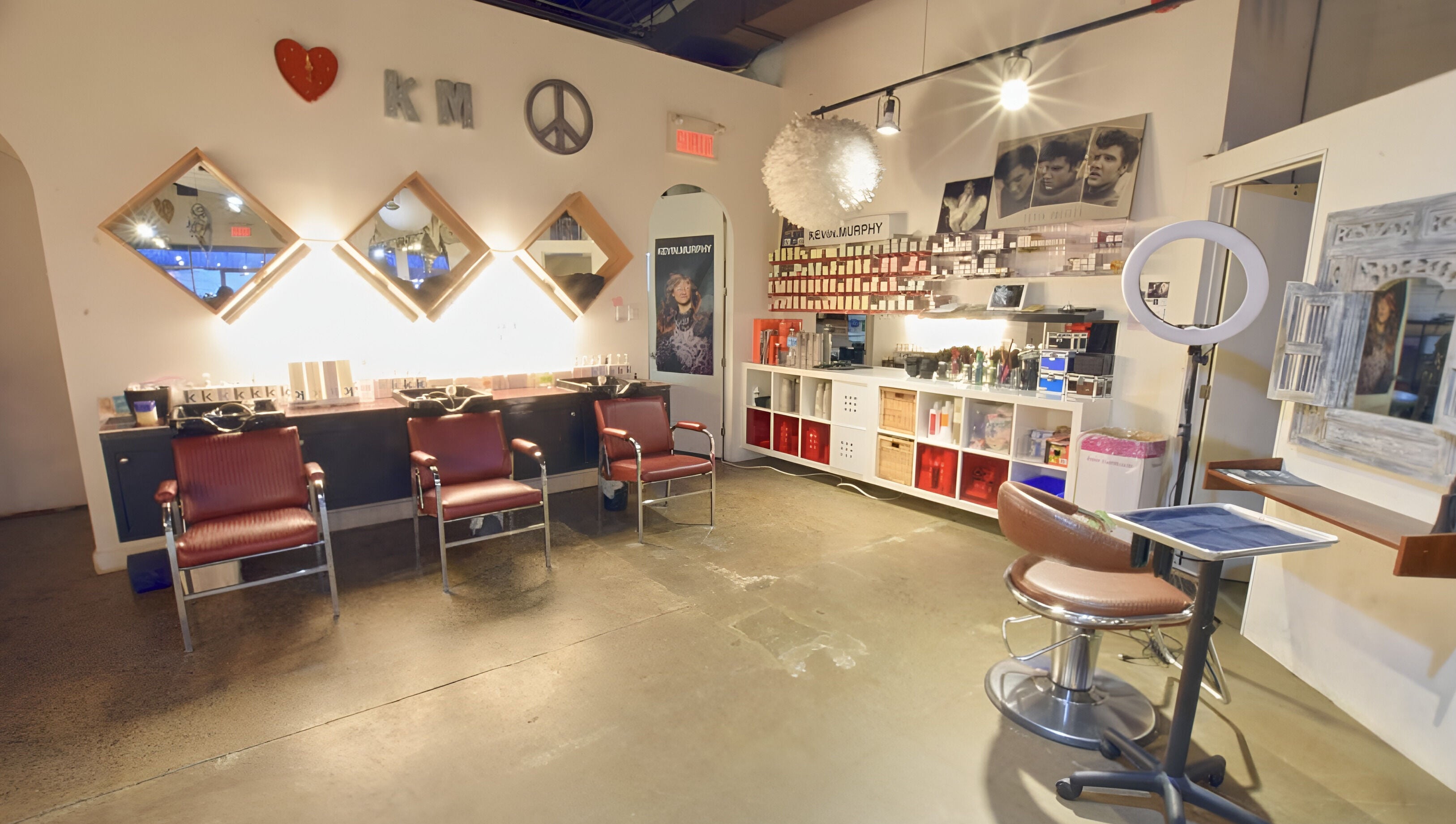 Modern interior of Revolution Hair Studio - Beaconsfield, featuring stylish seating and decor in Beaconsfield, Québec, CA.