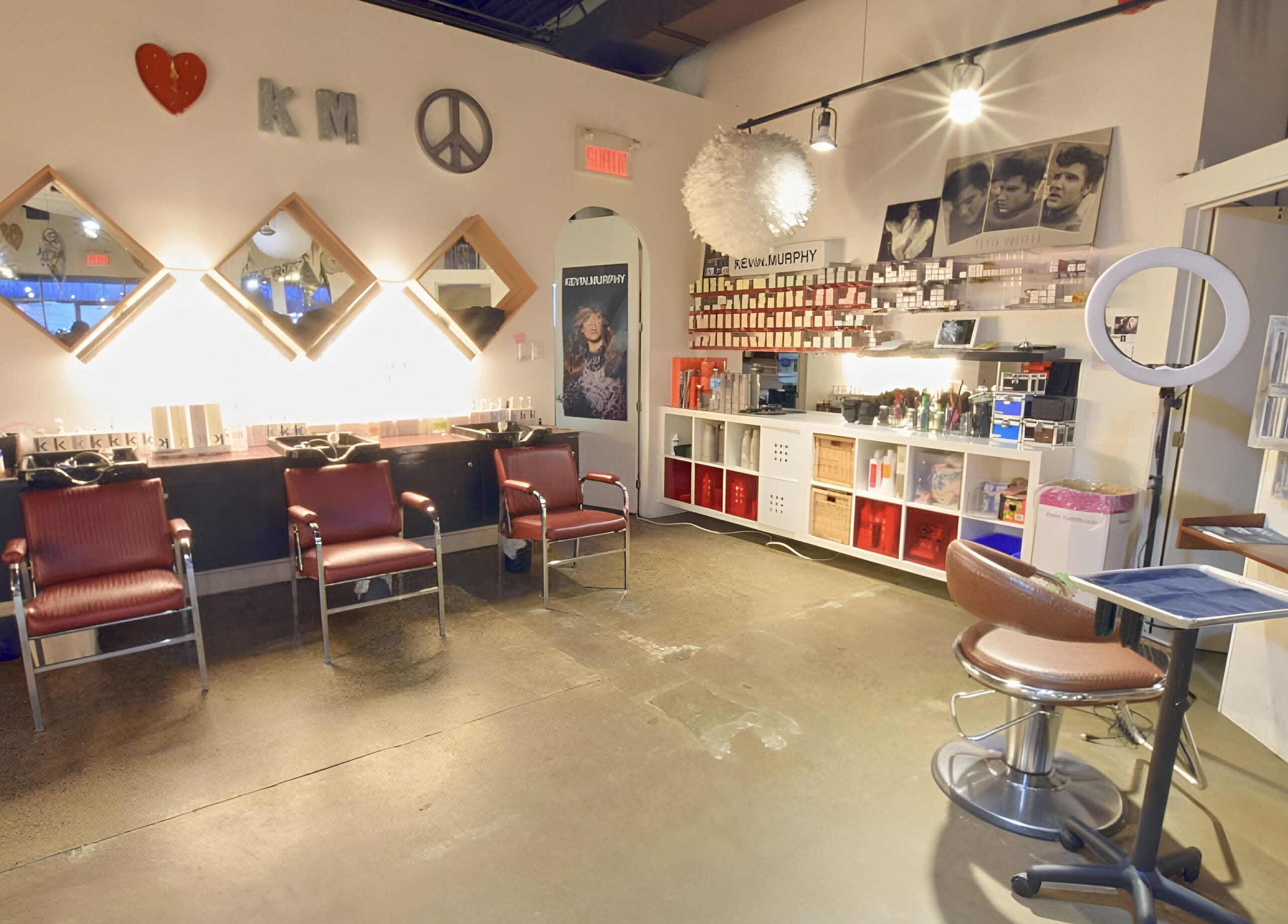 Modern interior of Revolution Hair Studio - Beaconsfield, featuring stylish seating and decor in Beaconsfield, Québec, CA.