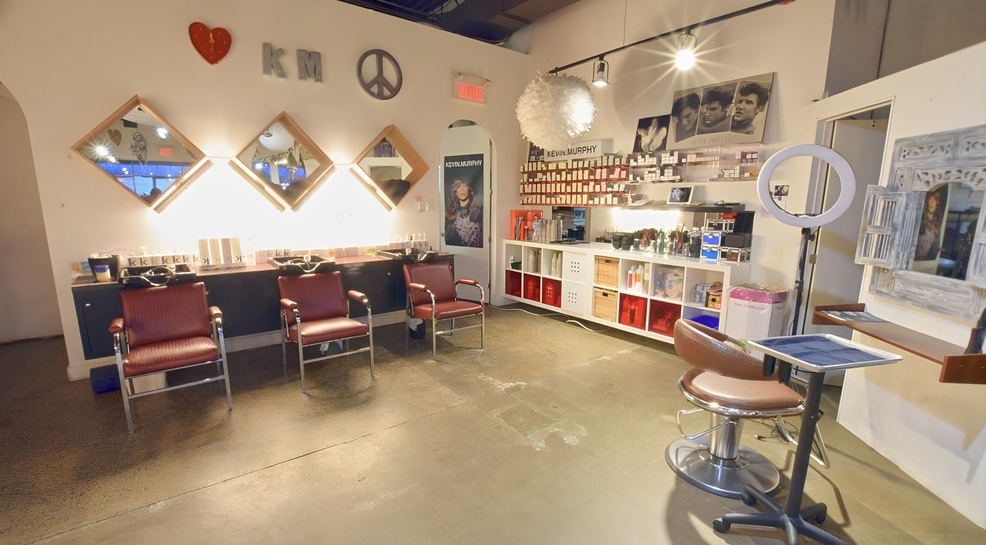 Modern interior of Revolution Hair Studio - Beaconsfield, featuring stylish seating and decor in Beaconsfield, Québec, CA.