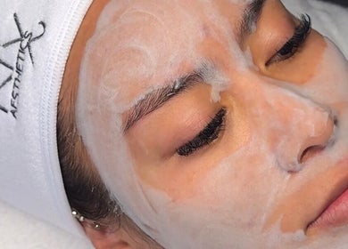 Client receiving facial treatment at Dr Avinash Nath Maraval Office, Port Of Spain, Diego Martin Regional Corporation, TT.