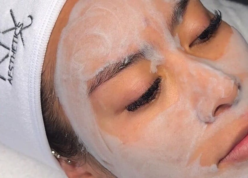 Client receiving facial treatment at Dr Avinash Nath Maraval Office, Port Of Spain, Diego Martin Regional Corporation, TT.