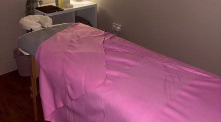 Relaxing massage table at ET Massage Therapy in Glasgow, Scotland, GB, ready for a calming session.