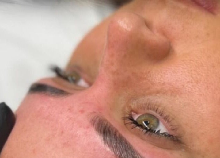 Close-up of eyebrow treatment at Luxe Beauty, Portsmouth, England, GB. Beautifully shaped brows enhance facial elegance.