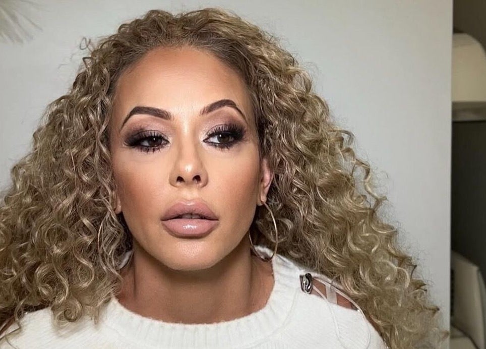 A person with styled curls and makeup at Luxe Beauty in Portsmouth, England, GB.