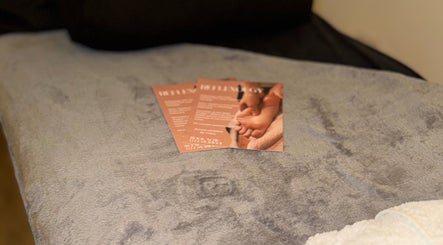 Relaxing brochures on a soft spa bed at Aurora Holistics by Tracy, Midsomer Norton, England, GB.