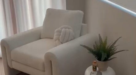 Comfortable seating area at Sculpt Labs - Marple, Stockport, England, GB, featuring a plush white chair.