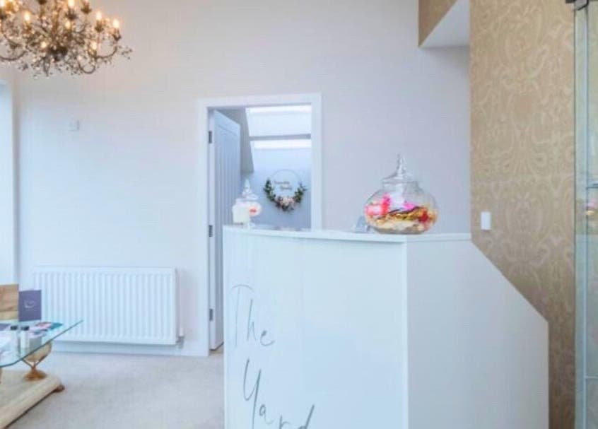 Elegant reception at Sculpt Labs - Nantwich in Burland, England, GB with chandelier and decorative accents.