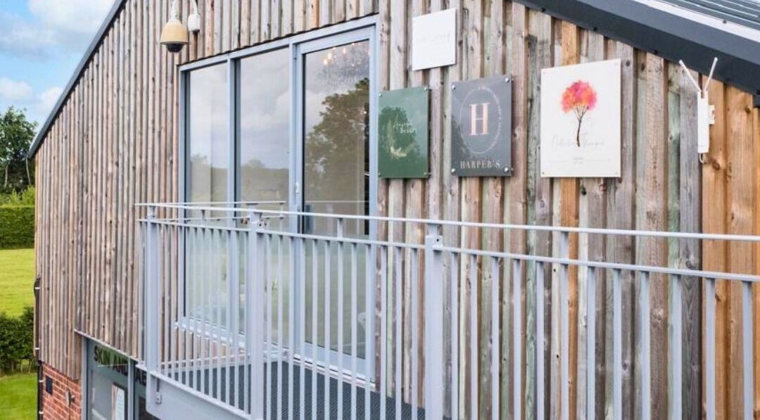 Exterior view of Sculpt Labs - Nantwich, featuring wooden facade in Burland, England, GB.