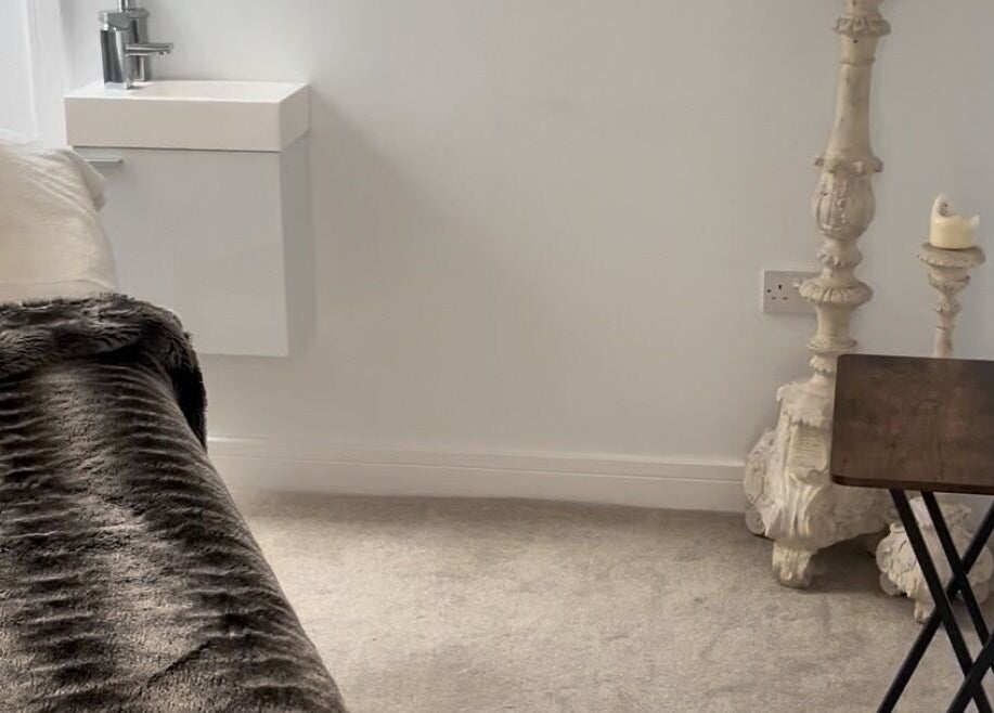 Tranquil therapy room at Sculpt Labs - Nantwich, Burland, England, GB with elegant decor.