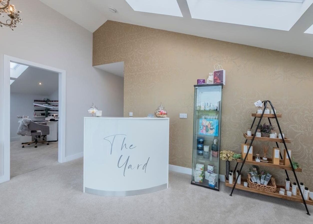 Elegant reception area at Sculpt Labs - Nantwich, Burland, England, GB. Features stylish decor and treatment room.