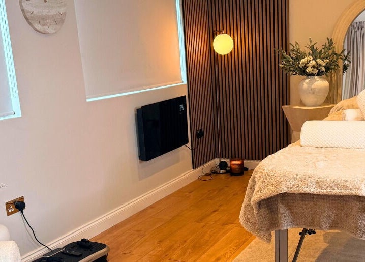 Relaxing massage room at Sculpt Labs - Marple, Stockport, England, GB with cozy decor and soft lighting.