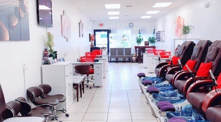 Interior of T Nail Spa, Coral Springs, Florida, showcasing modern nail stations and cozy seating.