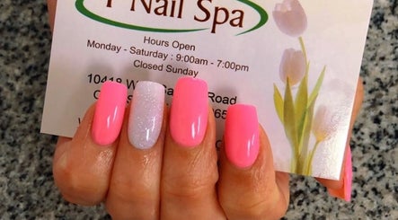 Bright pink and glitter nails at T Nail Spa, Coral Springs, Florida, US showcasing elegant glossy finish.