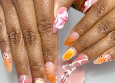 Elegant floral nail design at Glow Up Beauty Lounge by Rei, Fort Meade, Maryland, US.