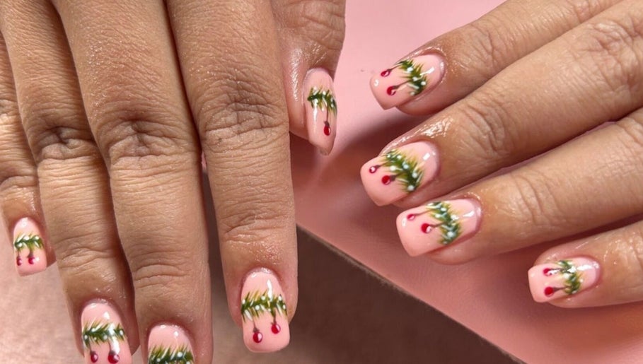 Holiday-themed nail art at Glow Up Beauty Lounge by Rei, Fort Meade, Maryland, US.