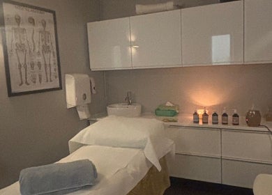Massage room at The Metropolis Massage, Surbiton, England, GB, featuring a well-prepared treatment table.