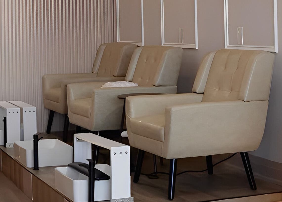 Comfortable pedicure chairs at Zoey Beauty Bar, Mississauga, Ontario, CA, offering luxury wellness services.