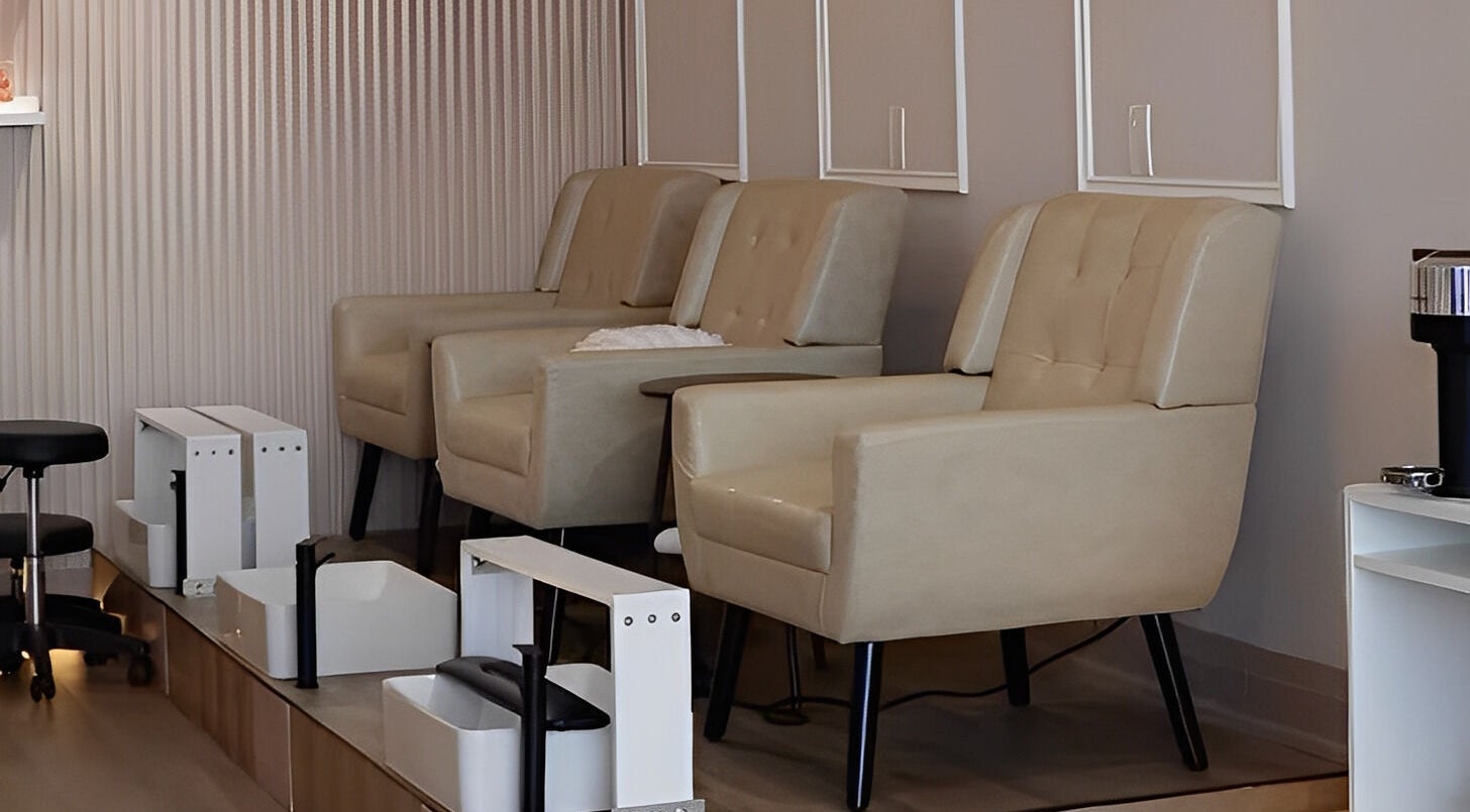 Comfortable pedicure chairs at Zoey Beauty Bar, Mississauga, Ontario, CA, offering luxury wellness services.