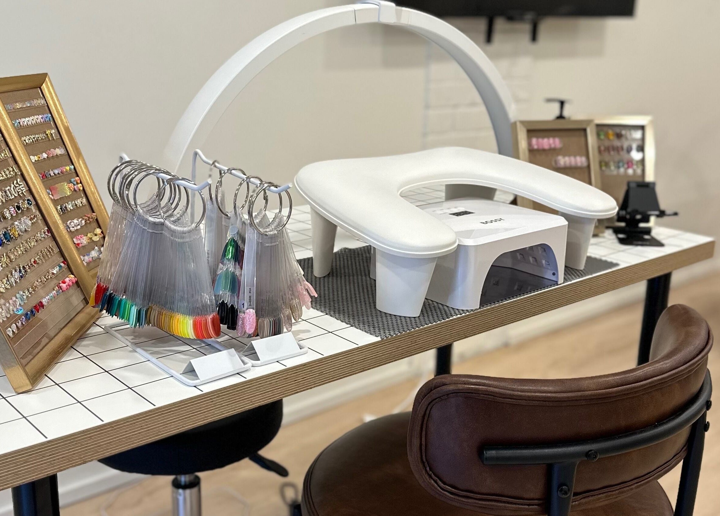 Nail art display and equipment at Studio Enu, Toronto, Ontario, CA. A modern and chic beauty experience.