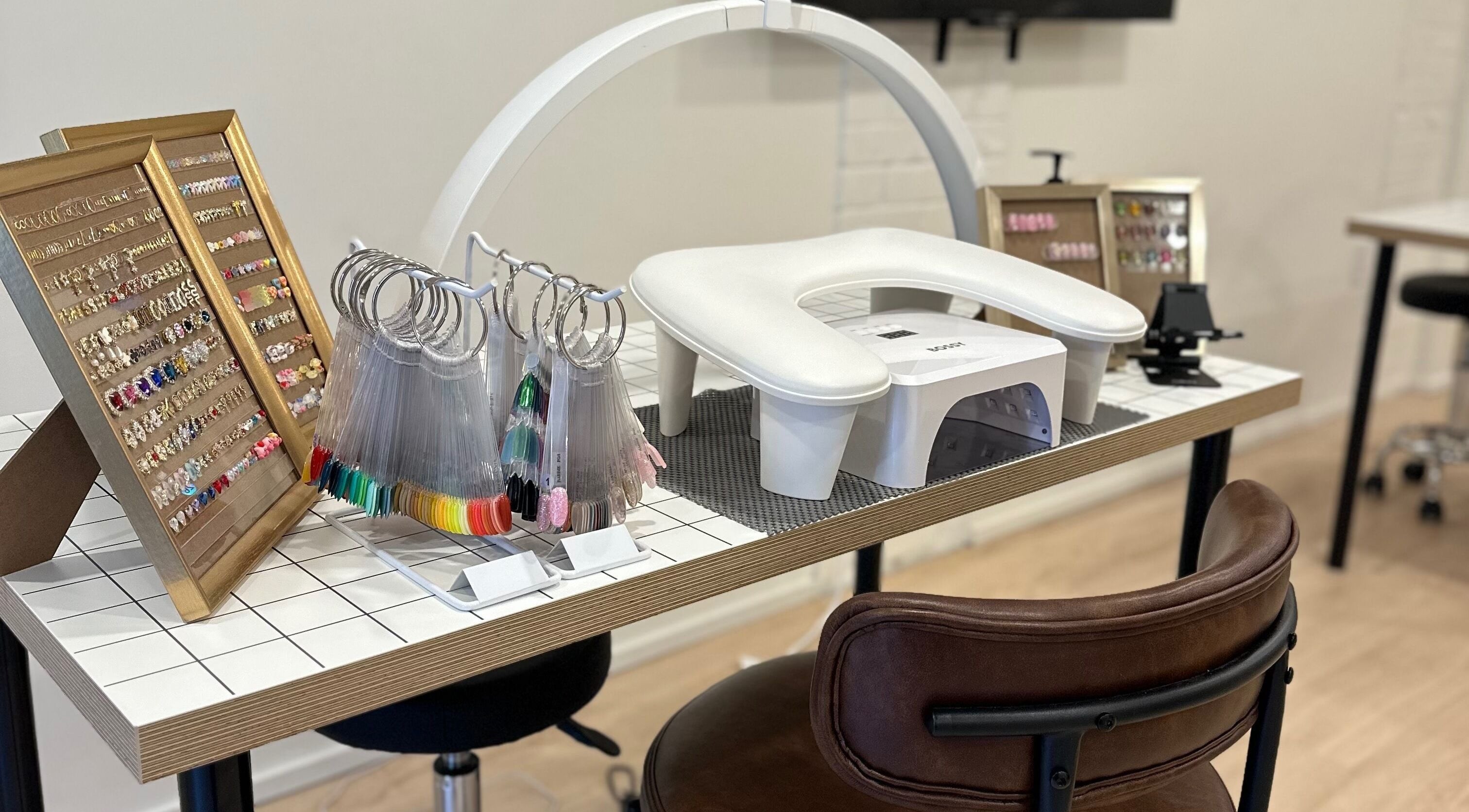 Nail art display and equipment at Studio Enu, Toronto, Ontario, CA. A modern and chic beauty experience.