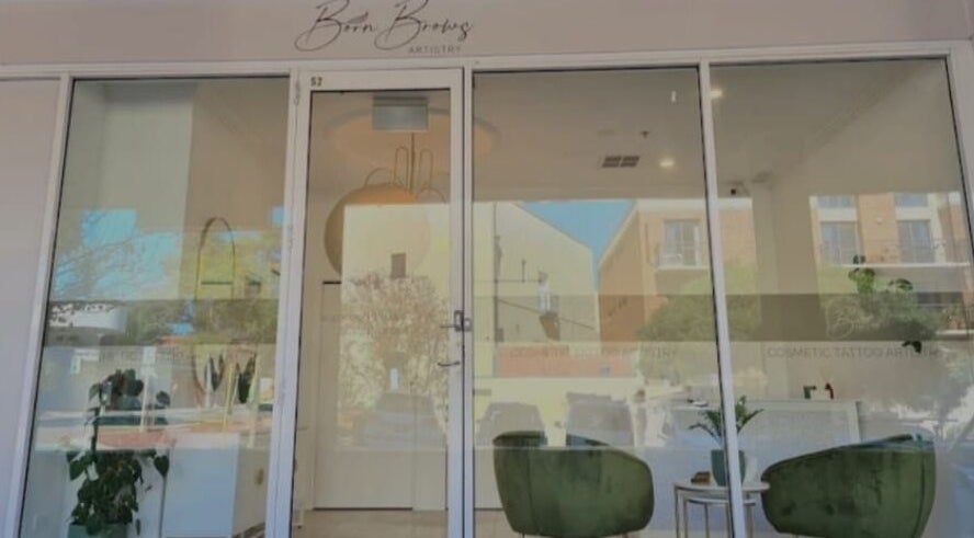 Elegant entrance of WinkBar Perth, Mount Lawley, Western Australia, AU with stylish decor and large glass doors.