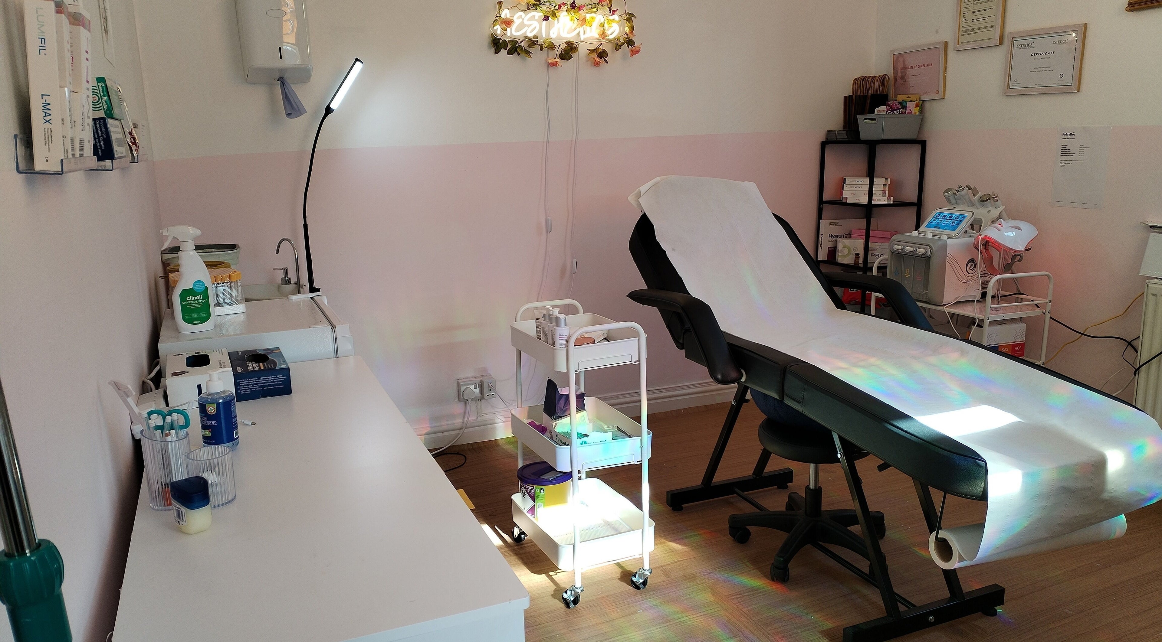 Treatment room at Serenity Aesthetics Studios, Nottingham, England, GB, featuring a reclining chair and equipment.