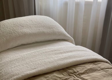 Luxurious treatment bed at Kalari Body and Face, Andergrove, Queensland, AU. Perfect for relaxation and rejuvenation.