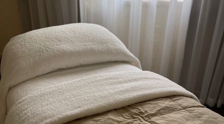 Luxurious treatment bed at Kalari Body and Face, Andergrove, Queensland, AU. Perfect for relaxation and rejuvenation.