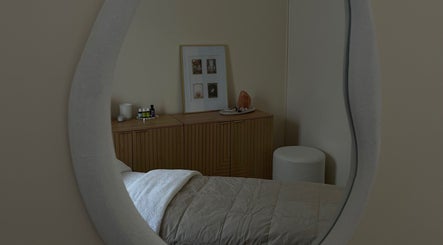Reflection of a tranquil treatment room at Kalari Body and Face, Andergrove, Queensland, AU.