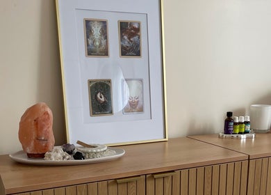 Peaceful altar at Kalari Body and Face in Andergrove, Queensland, AU with salt lamp and framed art.