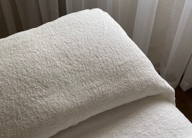 Plush white towel ready for a soothing treatment at Kalari Body and Face, Mackay, Queensland, AU.