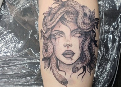 Intricate Medusa tattoo at Teel Ink'd Tattoo, Rochdale, England, GB, featuring snakes entwined in hair.
