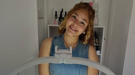 Smiling staff at Kris's Nails, Washaway, England, GB, welcoming clients with a warm ambiance.
