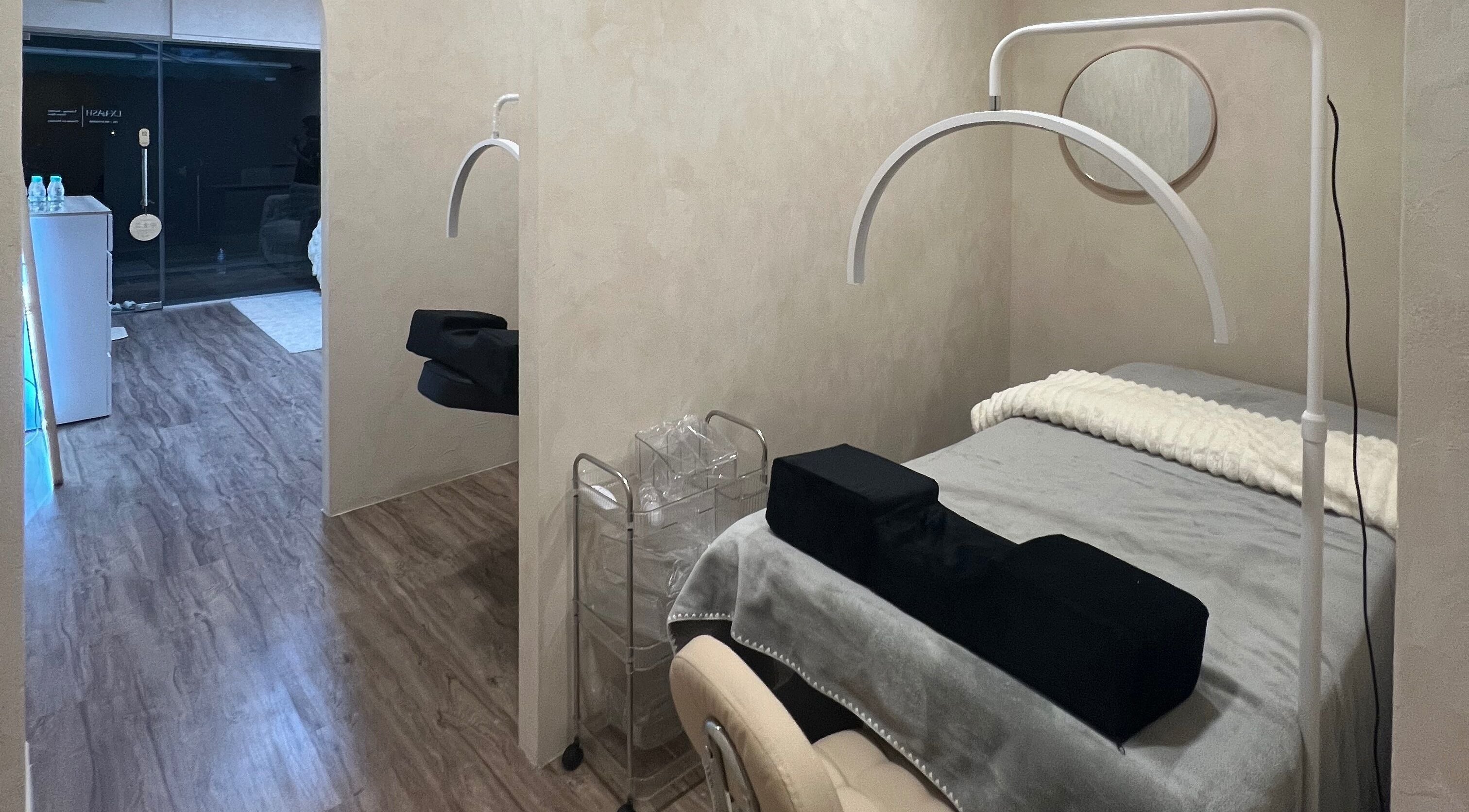Cozy treatment room at Lx Lash (Bedok), Singapore, SG with soft lighting and modern decor.