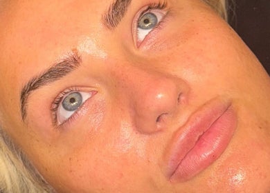 Radiant face after treatment at Pure Aura Studio, Hindley Green, England, GB