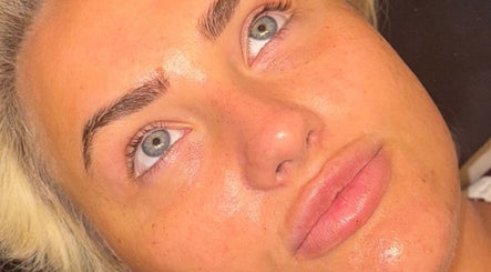 Radiant face after treatment at Pure Aura Studio, Hindley Green, England, GB